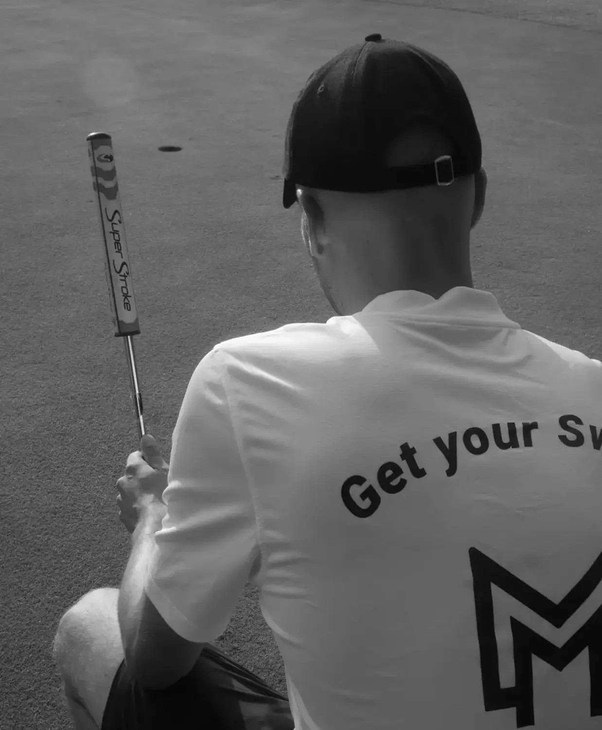 Hinterteil eines Mannes auf dem Golffeld von Getyourswing